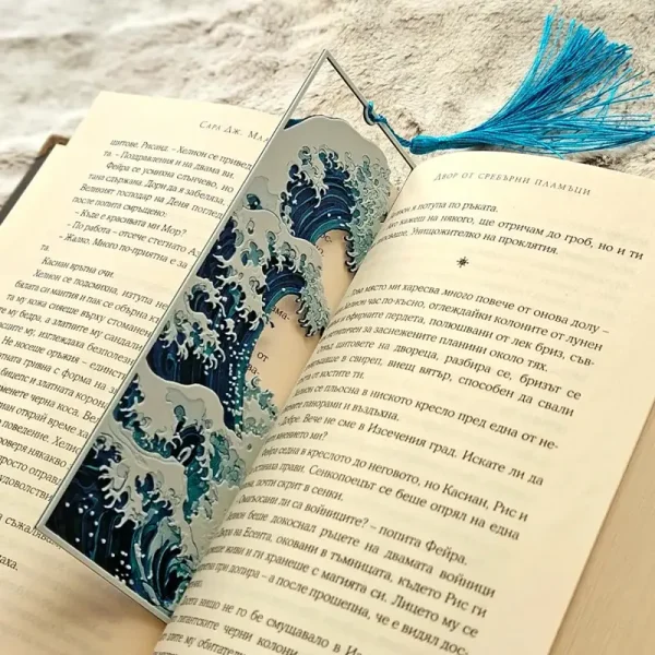 Close-up of custom 3D printed bookmark showcasing intricate Kanagawa wave design and blue tassel, ideal for B2B clients and book lovers