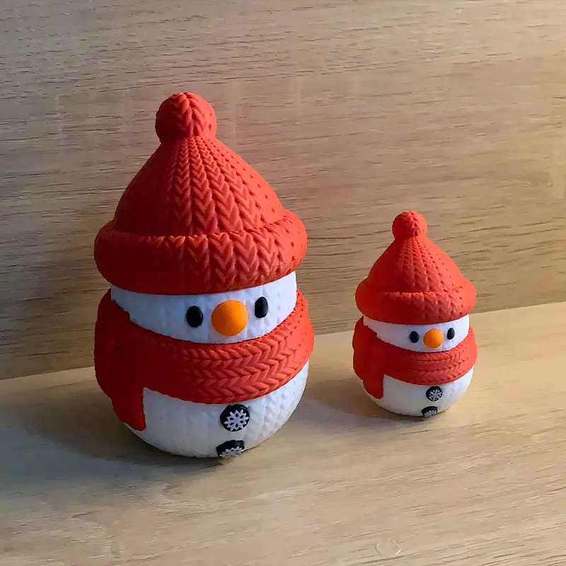 Customizable Christmas snowman figurines with red knit hats and scarves for holiday decorating