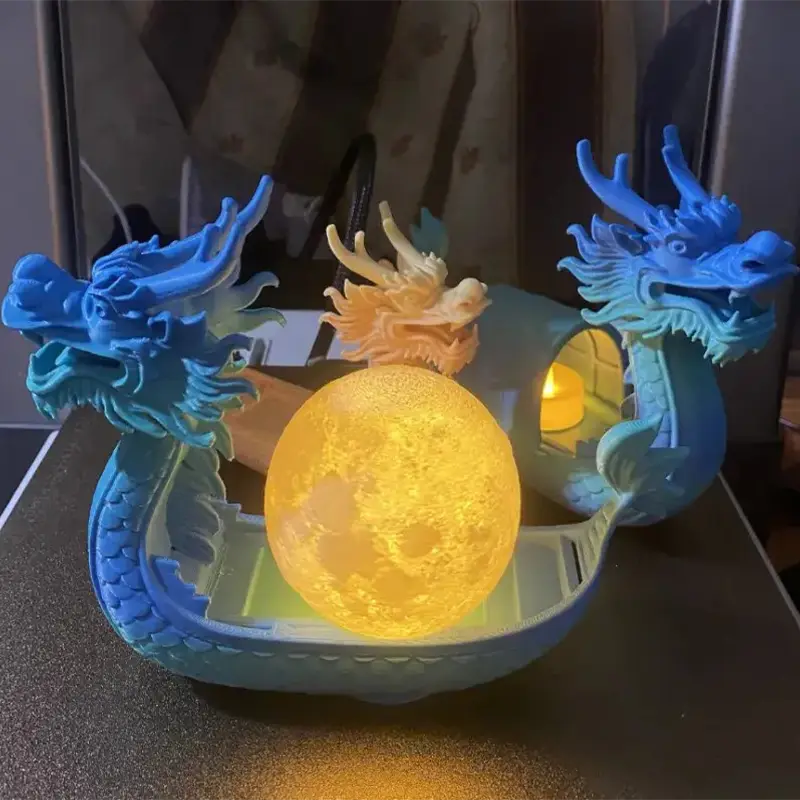 Artisanal 3D printed dragon boat lamp base with detailed dragon heads and central moon-like lighting, perfect for B2B clients