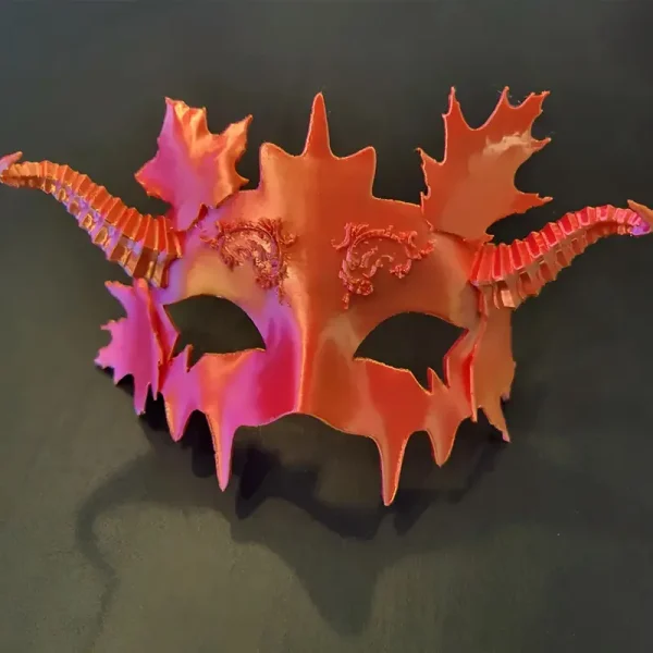 Close-up view of a custom 3D-printed Halloween ball mask, showcasing intricate details and quality craftsmanship for business events