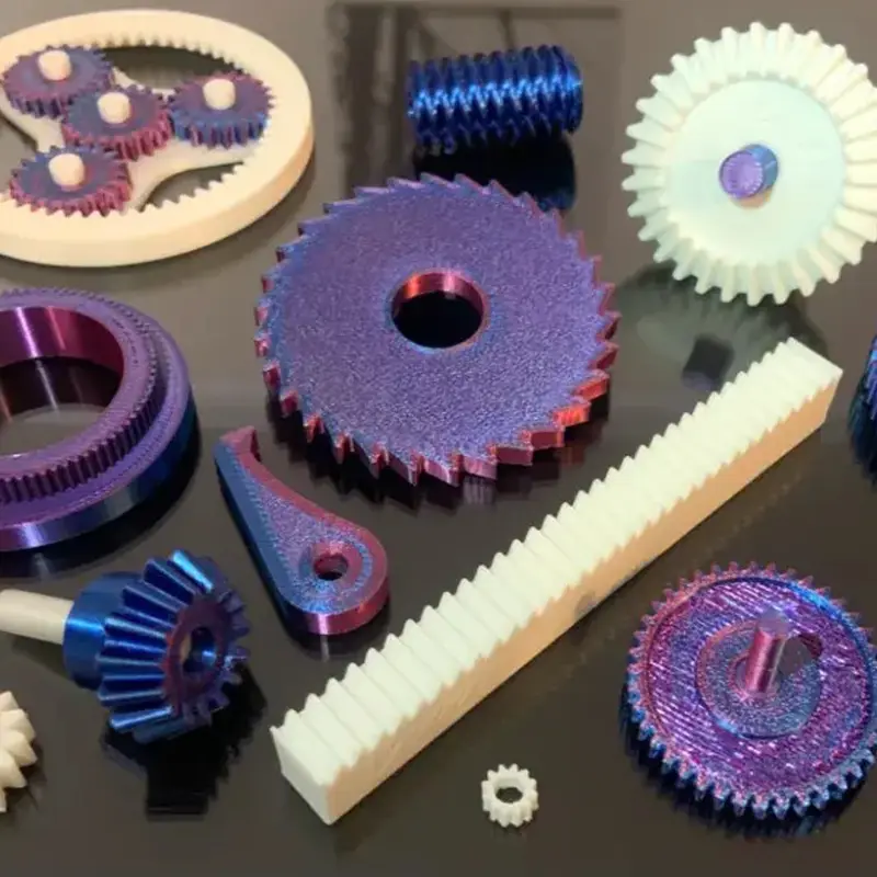 Assortment of custom 3D printed industrial components in various geometries and colors on display