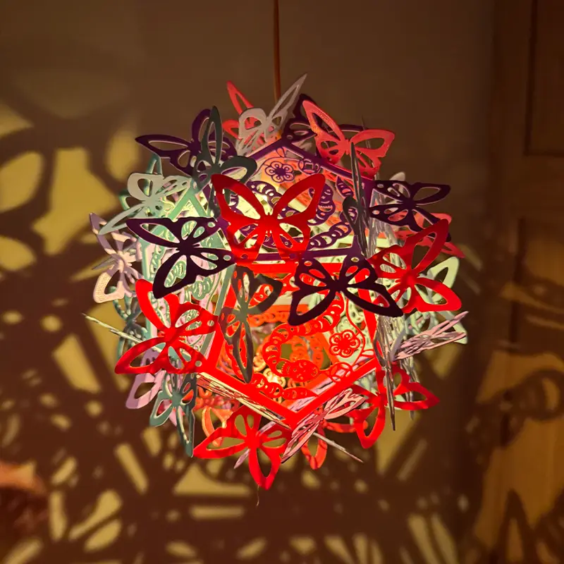 Close-up of 3D printed butterfly lantern showing detailed cut-outs and warm glow, ideal for Spring Festival decor and B2B clients