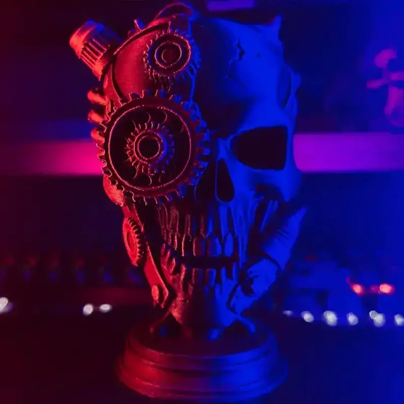 Close-up of a 3D printed cybernetic skull sculpture showcasing intricate gear structures and realistic skull design