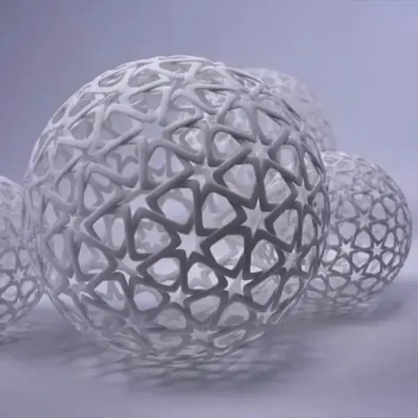 Set of four 3D printed festive sphere ornaments with intricate star patterns, semi-transparent white finish on gray background