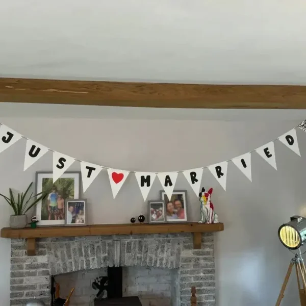 Close-up of personalized wedding bunting showing detailed lettering and patterns for B2B clients