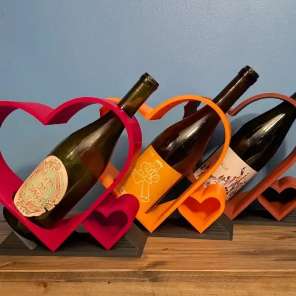 3D printed heart-shaped bottle cradle showcasing sophisticated design for B2B clients and wedding professionals