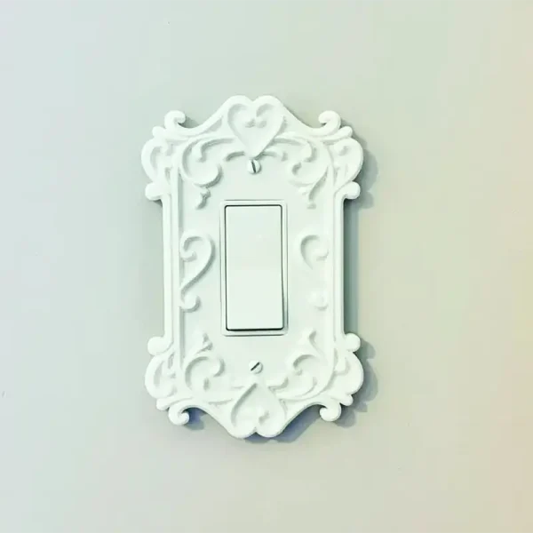 Close-up of Victorian ornate switch plate showing intricate patterns for B2B clients