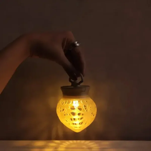 Custom 3D printed tree-fruit lamp showcasing natural design elements and warm illumination for hotels