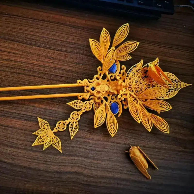 Elegant 3D printed Chinese hairpin with intricate floral patterns and butterfly decorations, displayed on wooden surface