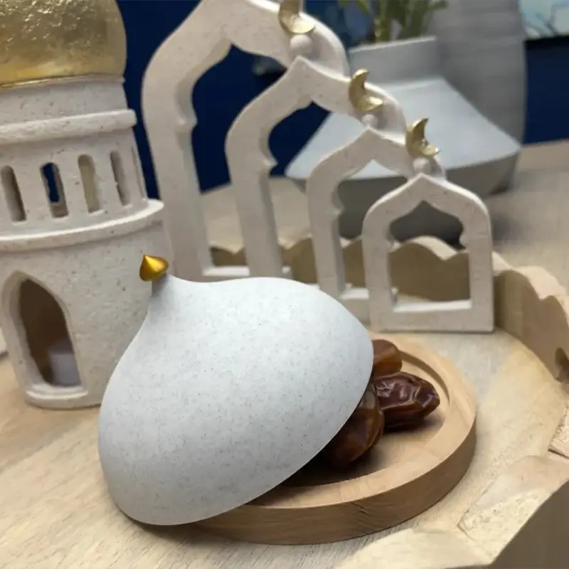 3D printed culinary display dome showcasing dates inside, placed on a wooden serving tray