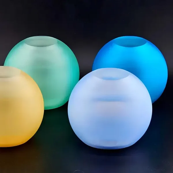Close-up view of color-shifting 3D printed orbs with smooth spherical design, ideal for B2B lighting solutions