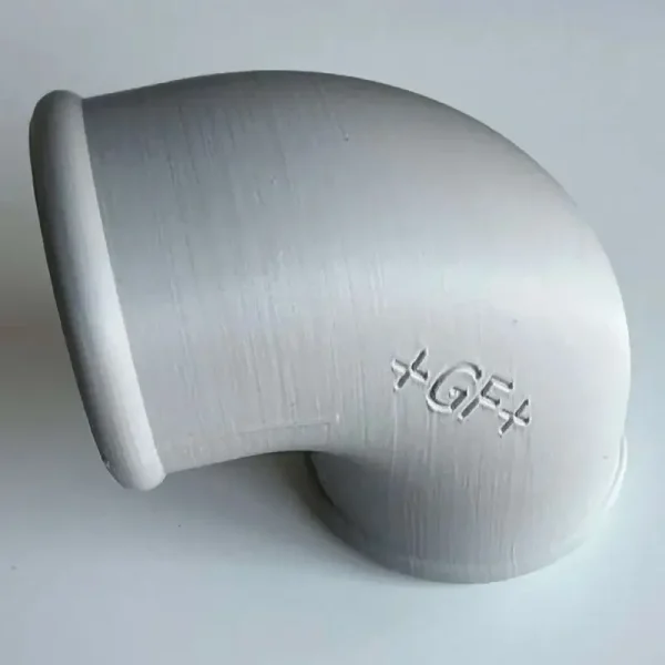 White 3D printed precision angled pipe connector with +GF+ certification marking on plain background