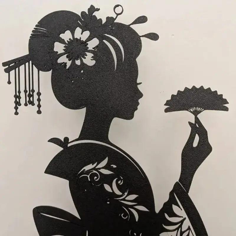 Artisanal 3D printed geisha silhouette sculpture holding a traditional fan with elaborate hair accessories