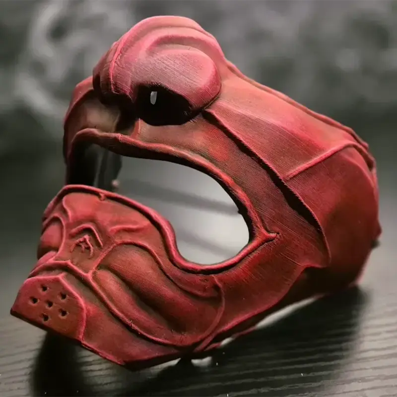 Handcrafted Oni-Samurai Halloween mask with detailed carvings, shown on a dark surface for B2B clients