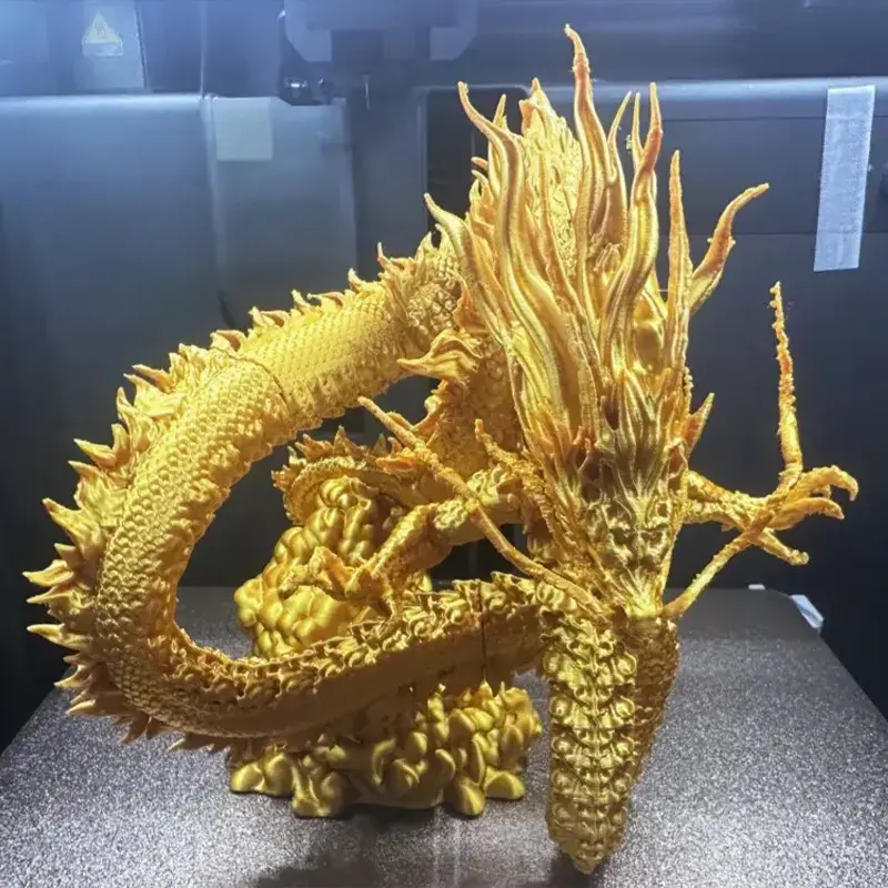 Detailed 3D printed Chinese dragon sculpture in golden finish, showcasing intricate scales and dynamic pose for B2B clients