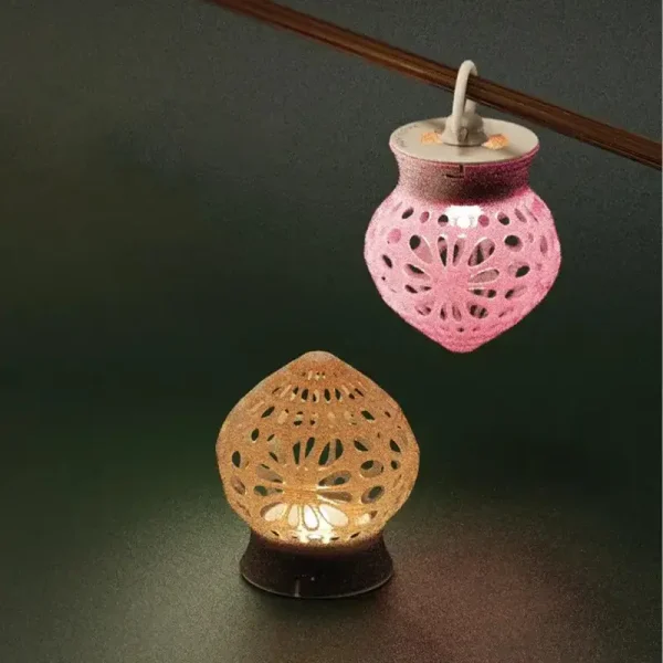 Elegant 3D printed tree-fruit lamp with intricate cut-outs emitting soft light, perfect for B2B commercial spaces