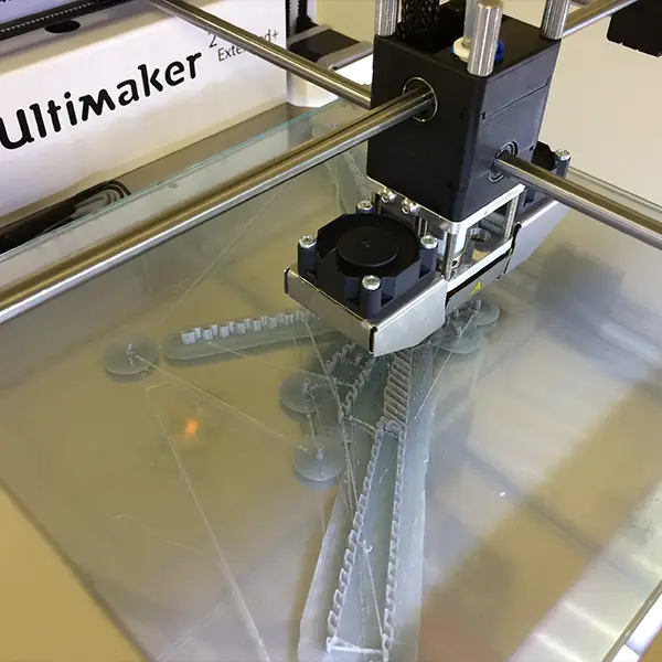 A compelling image showing the evolution of a custom 3D printed part, from a CAD screen view to a prototype in someone's hand, to a large batch of finished products, illustrating Yuesun3D's seamless process.