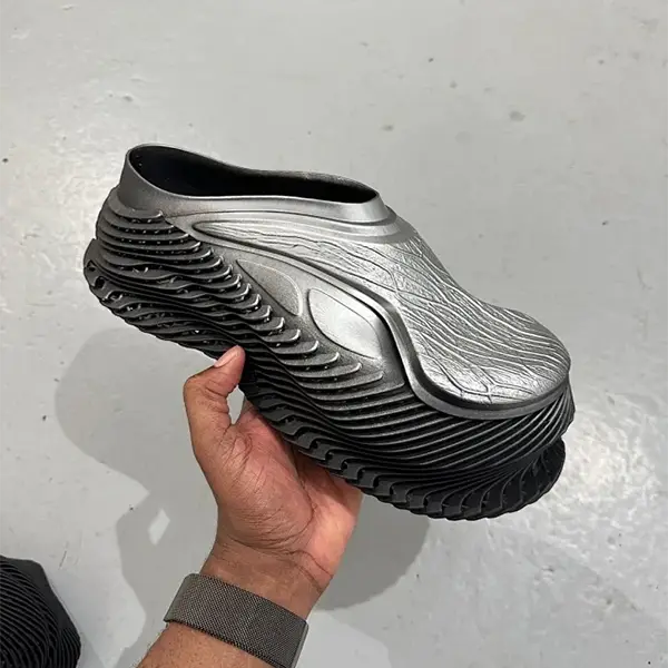 Array of custom 3D printed kitchen organizers including spice racks, utensil holders, and bag clips demonstrating practical 3D printing daily necessities